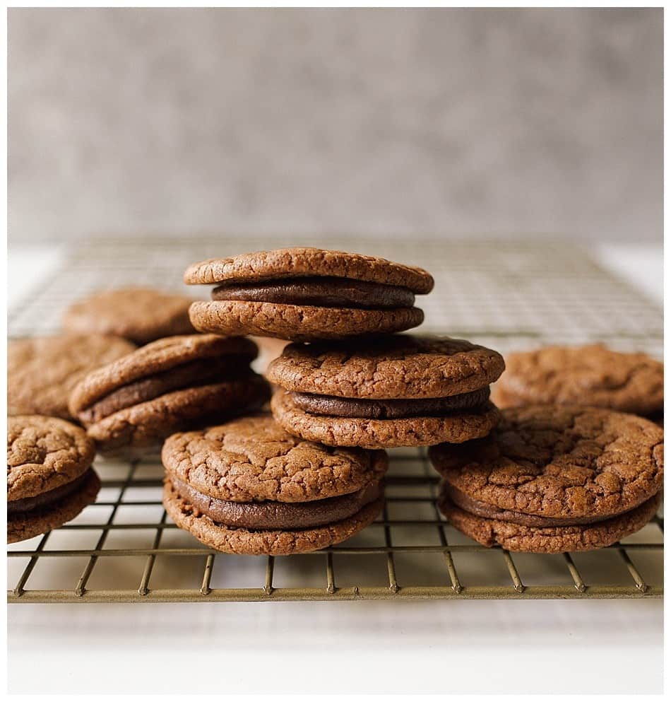 Mint Chocolate Sandwich Cookies Recipe by The Wood and Spoon Blog by Kate Wood. Chewy chocolate cookies made from semisweet chocolate filled with a simple Andes mint chocolate ganache. This cookie sandwiches are a fun cookie to make with kids and taste delicious for the chocolate and mint lovers. Make ahead and freeze cookies if you know how to! Find the recipe at thewoodandspoon.com