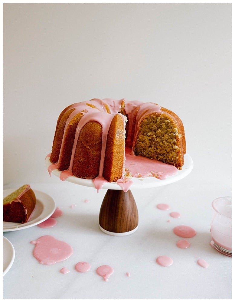 Blood Orange Bundt Cake Recipe by The Wood and Spoon Blog by Kate Wood. A vanilla and citrus scented cake made with blood orange zest and juice, this bundt cake is fluffy, moist, and an easy one bowl recipe what to make with blood oranges. The glaze is a simple blood orange juice icing that is pink and so fun to make! This makes a large bundt cake but you can adapt it to make it in round pans or even muffin tins. You could try this recipe in a tube pan with removable bottom as well. Find this winter citrus, festive cake on thewoodandspoon.com