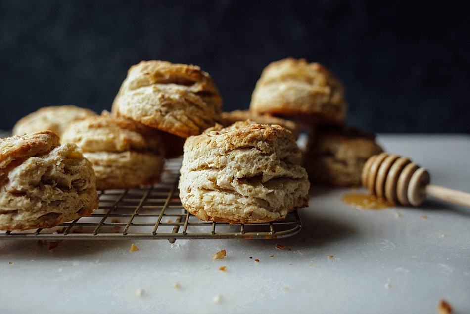 Honey Nut Biscuits Recipe by The Wood and Spoon Blog. Flaky butter biscuits sweetened naturally with honey and filled with nuts like pecans or walnuts. This simple recipe makes biscuits with lots of layers and doesn't require laminating. Recipe and other Mother's Day breakfast in bed menu inspiration on thewoodandspoon.com // woodandspoon.com