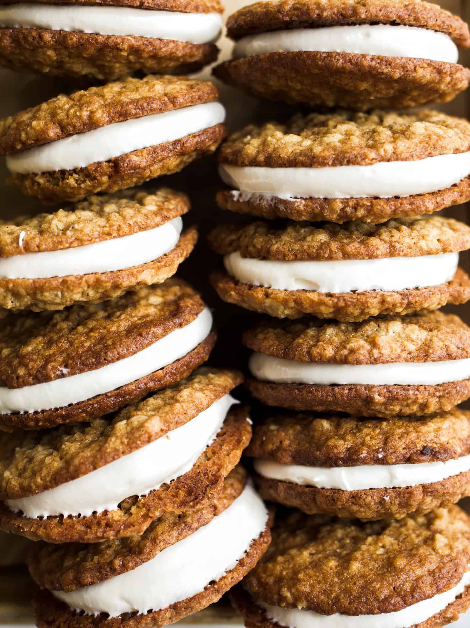 Oatmeal Cream Pies by Wood and Spoon blog. This copycat recipe is a sandwich cookie featuring soft, chewy oatmeal cookies and a simple marshmallow fluff filling. These cookies make a great treat for people who love Little Debbie snacks and are fun for kids to make too! Find the recipe and learn how to on thewoodandspoon.com .