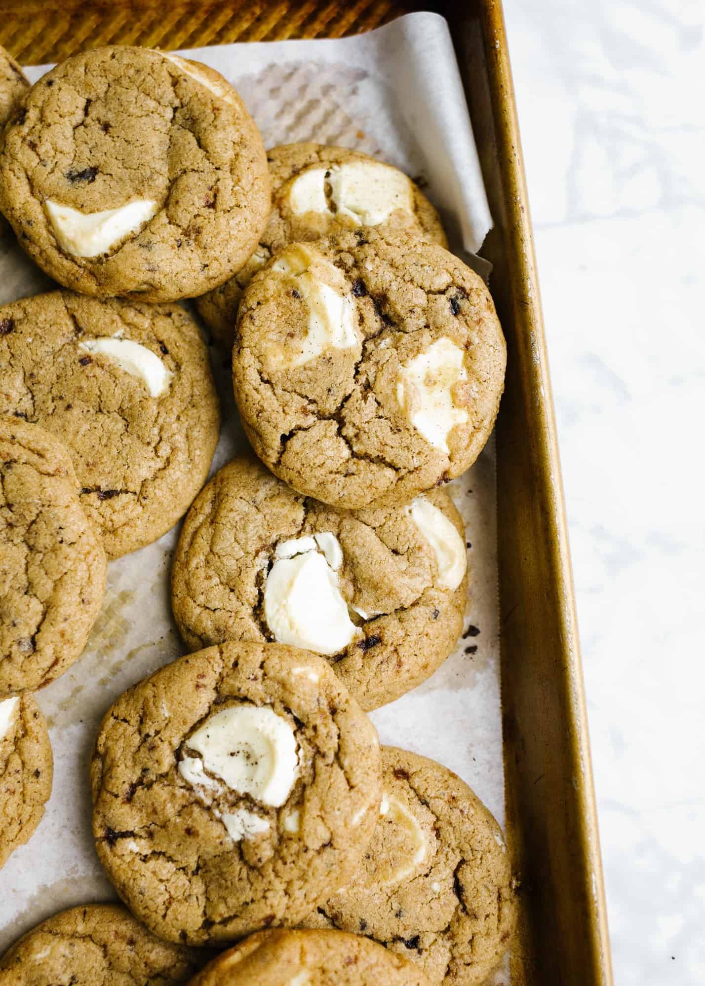 Espresso White Chocolate Chunk Cookies by Wood and Spoon. These are chewy coffee-scented cookies loaded with big chunks of sweet white chocolate. The cookies are simple to put together, freeze well, and make a great dessert option for coffee and chocolate lovers alike. Learn how to make this simple cookie recipe on thewoodandspoon.com