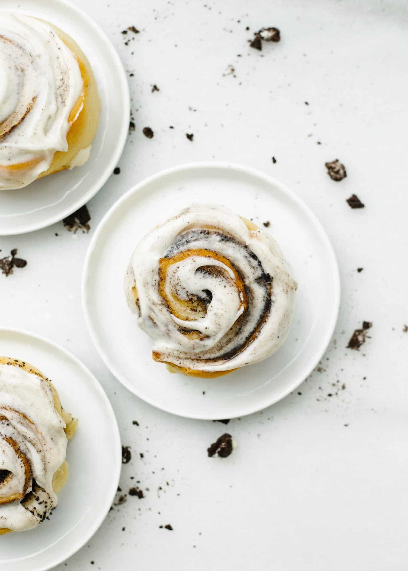 Cookies and Cream Rolls by Wood and Spoon blog. Here, King Arthur Flour's #recipeoftheyear for pillowy cinnamon rolls is transformed with a cookies and cream filling and sweetened ooey glaze. The rolls are soft and fluffy and the lightly sweetened filling is the perfect match for the buttery frosting. Learn how simple it is to make from scratch cinnamon rolls with chocolate sandwich cookies on thewoodandspoon.com