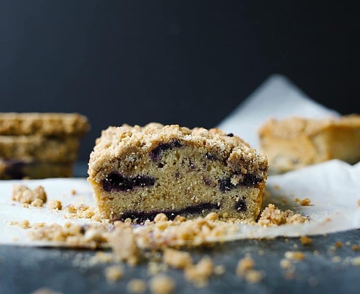 Brown Sugar Pound Cake with Blueberries and Brown Butter Crumb Topping Recipe by The Wood and Spoon Blog by Kate Wood. This recipe makes two loaves of moist southern style pound cake swirled with blueberries and topped with a brown butter brown sugar crumble. This is a simple recipe with many of the elements being make ahead. This is also a great breakfast loaf/ dessert to share with friends because there are two cakes made! Find the recipe on thewoodandspoon.com