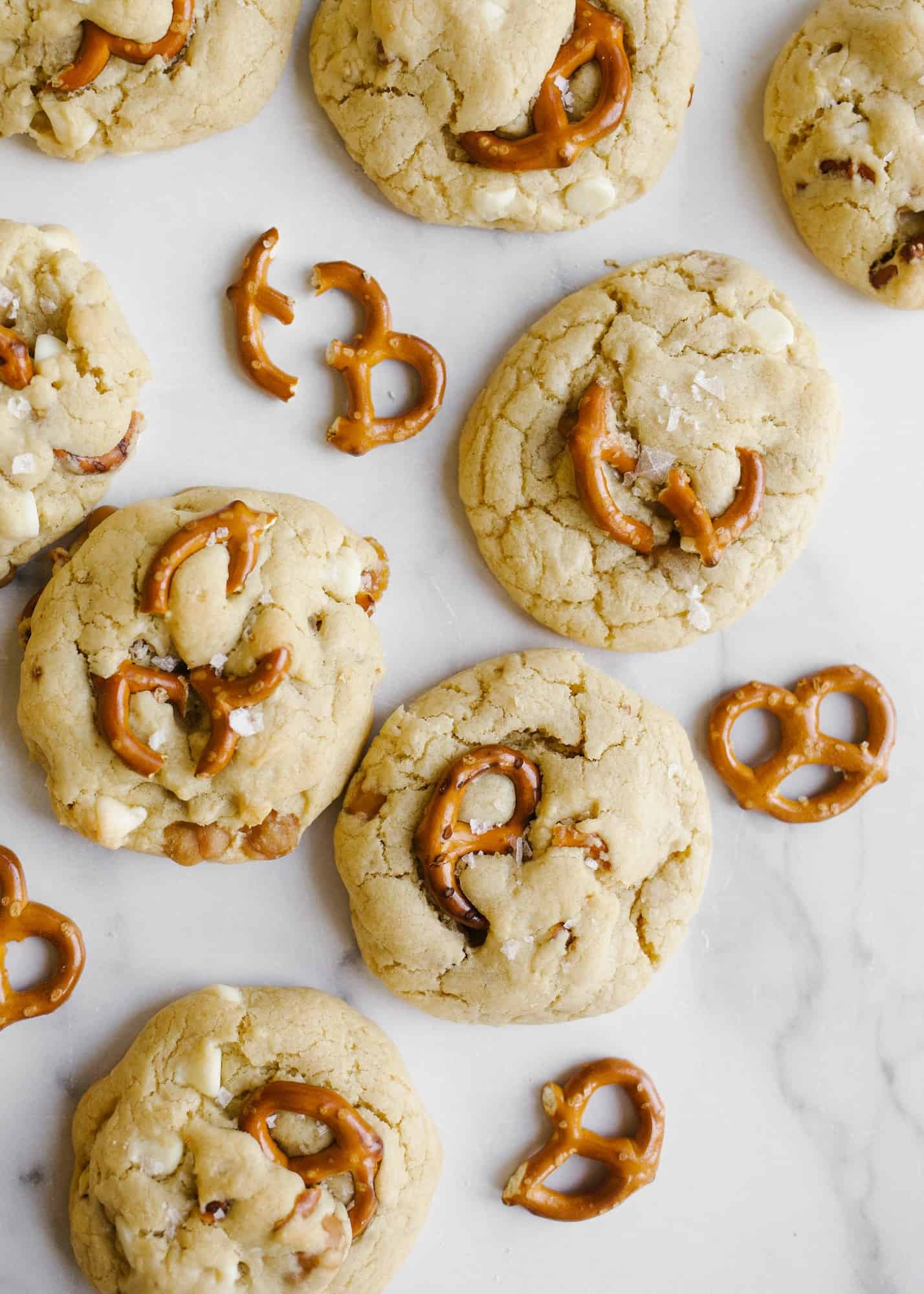 White Chocolate Caramel Pretzel Cookies by Wood and Spoon blog. These are white chocolate chip cookies filled with caramel bits and nibs and chunks of salted pretzels. These sweet and salty cookies make terrific group desserts for a crowd and are a delicious treat. Learn how to make these melted butter cookies with the recipe on thewoodandspoon.com by Kate Wood.