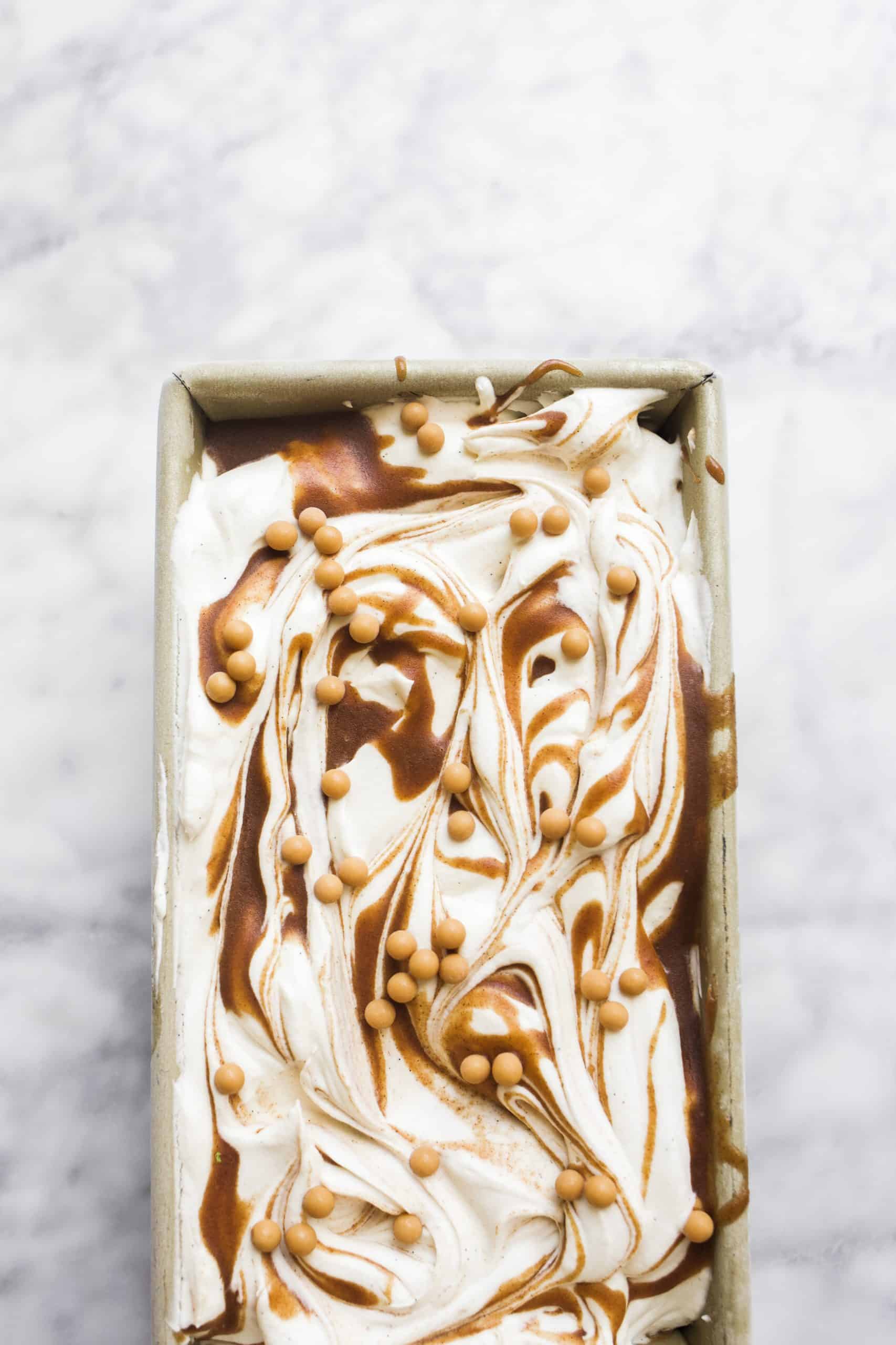 No-Churn Cinnamon Maple Swirl Ice Cream by Wood and Spoon. This simple homemade ice cream is the perfect addition to holiday and thanksgiving pies. A vanilla bean base is swirled with a stovetop maple and cinnamon sauce that is made with brown sugar. This ice cream takes less than 10 minutes to make and will taste terrific served as an accompaniment or just by itself. Learn how to make no churn ice cream on thewoodandspoon.com by Kate Wood.