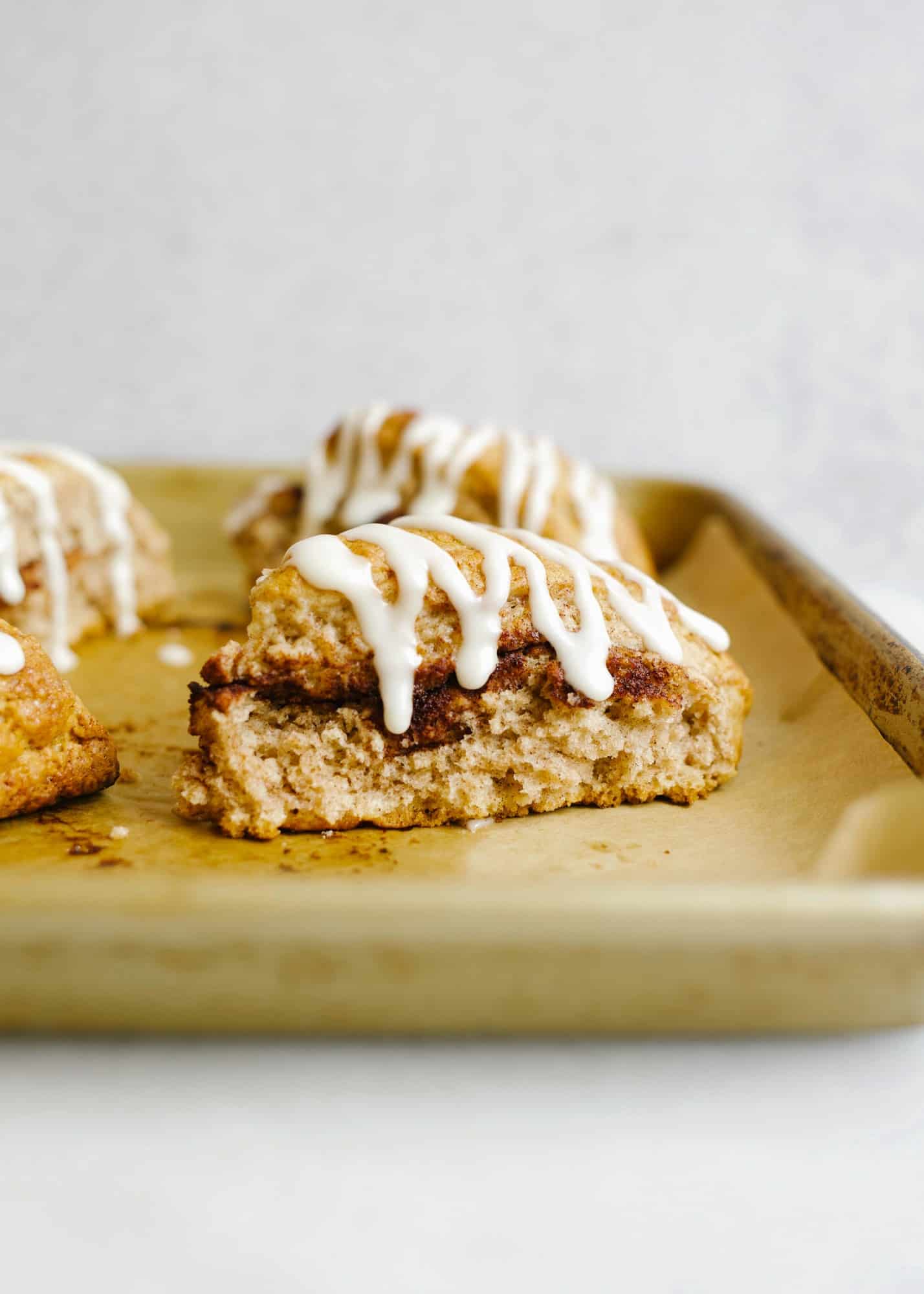 Cinnamon Sugar Scones and our time traveling to Winston-Salem North Carolina by Wood and Spoon blog. Make-ahead breakfast pastries swirled and stuffed with cinnamon filling and topped with a simple icing. These scones are great for holiday breakfast or brunch and go great with a cup of coffee. Read about what to do eat and see in North Carolina including Moravian cookies, best hotels for kids, best breweries and where to eat! Thewoodandspoon.com travels