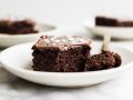 Fudgy Chocolate Sheet Cake by Wood and Spoon Blog. This is a simple recipe made without a stand mixer. The cake is scented with cocoa powder and coffee and the easy pour-on stovetop glaze makes it sweet and fudgy. A sprinkle of salt makes this crowd-pleasing dessert a little sweet and salty. Learn how simple it is to make this potluck All-star cake on thewoodandspoon.com