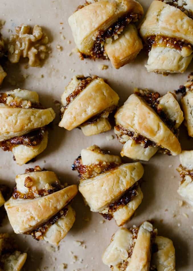 Sweet and Savory Rugelach by Wood and Spoon blog. These are traditional rugelach cookies made two ways: one with a blue cheese, fig spread, and Diamond Walnuts filling, and another made with white chocolate and Marcona almonds. The savory cookie is a perfect small bite appetizer for holiday gatherings and the white chocolate one is a decadent dessert. The pastry here flakes up and crisps almost like pastry dough. Try these yummy holiday treats with the recipe on thewoodandspoon.com