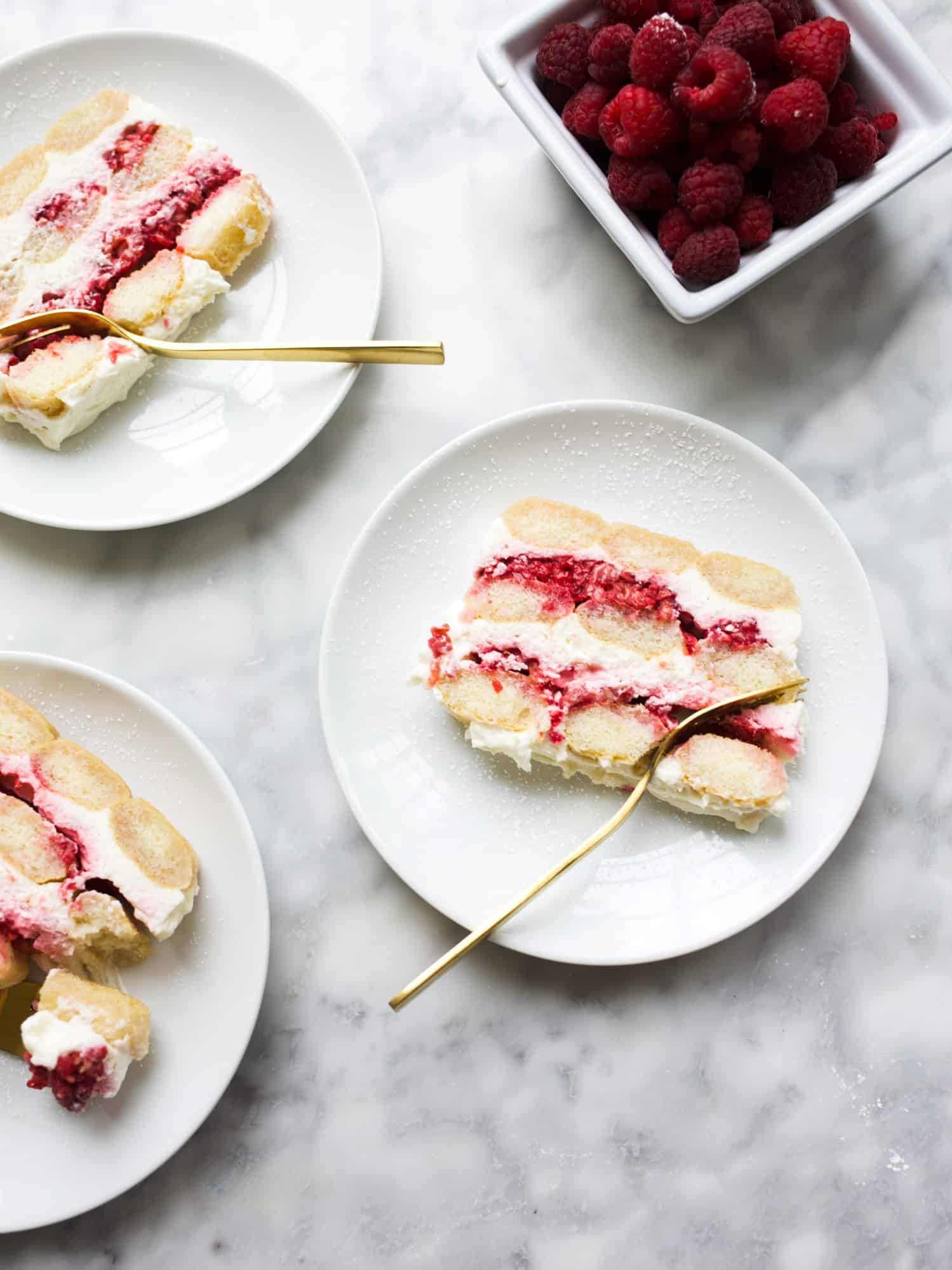 Raspberry Tiramisu by Wood and Spoon Blog. This is a recipe for a raspberry jam and whipped mascarpone tiramisu using ladyfingers and no eggs. This summery recipe comes together easily and feeds a crowd. Learn how simple the recipe is at thewoodandspoon.com