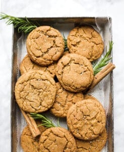 Chewy Ginger Molasses Snickerdoodles by Wood and Spoon Blog. This is a soft spiced cookie sweetened with brown sugar and molasses and tossed in a cinnamon sugar. These holiday cookies are perfect for Christmas and make a great alternative to gingerbread. Learn more about the recipe on thewoodandspoon.com.