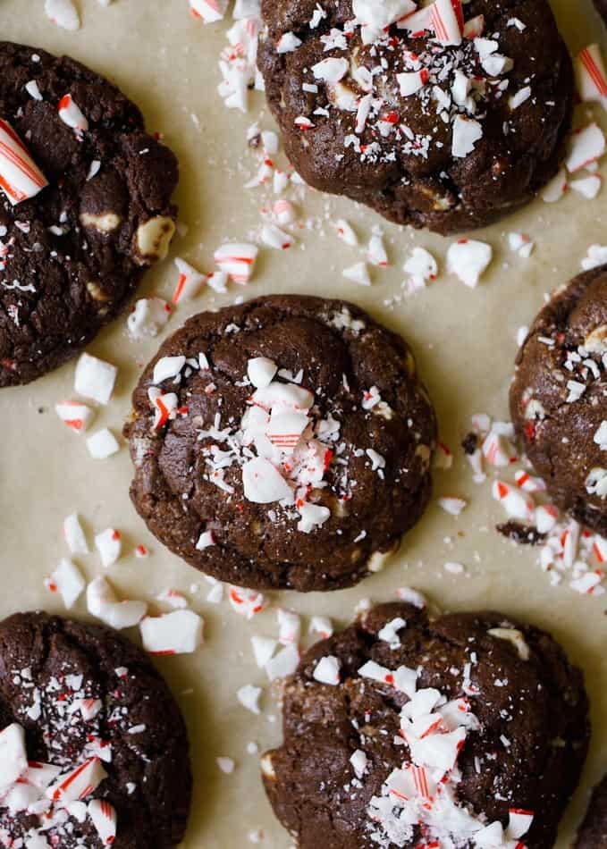 Chocolate Peppermint Olive Oil Cookies by Wood and Spoon blog. These are chewy chocolate cookies with bits of candy cane throughout! Using Lucini olive oil instead of butter, these cookies are chewy, soft, and tender, and have loads of delicious holiday flavor. Learn more about these simple treats on thewoodandspoon.com and try them out this Christmas at your holiday gift exchange!