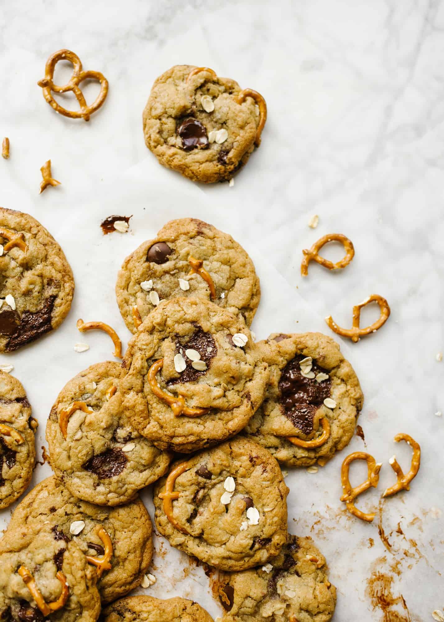 Kitchen Sink Cookies by Wood and Spoon blog. This is a catch-all chocolate chip cookie loaded with pretzels, toffee, oats and dark chocolate chunks and chips! The dough is adaptable and can be used with a number of other mix-ins: dried fruit, white chocolate, peanut butter chips, and more! This simple recipe comes together quickly, freezes well, and is a delicious chewy treat for all year round. Read more about the recipe on thewoodandspoon.com