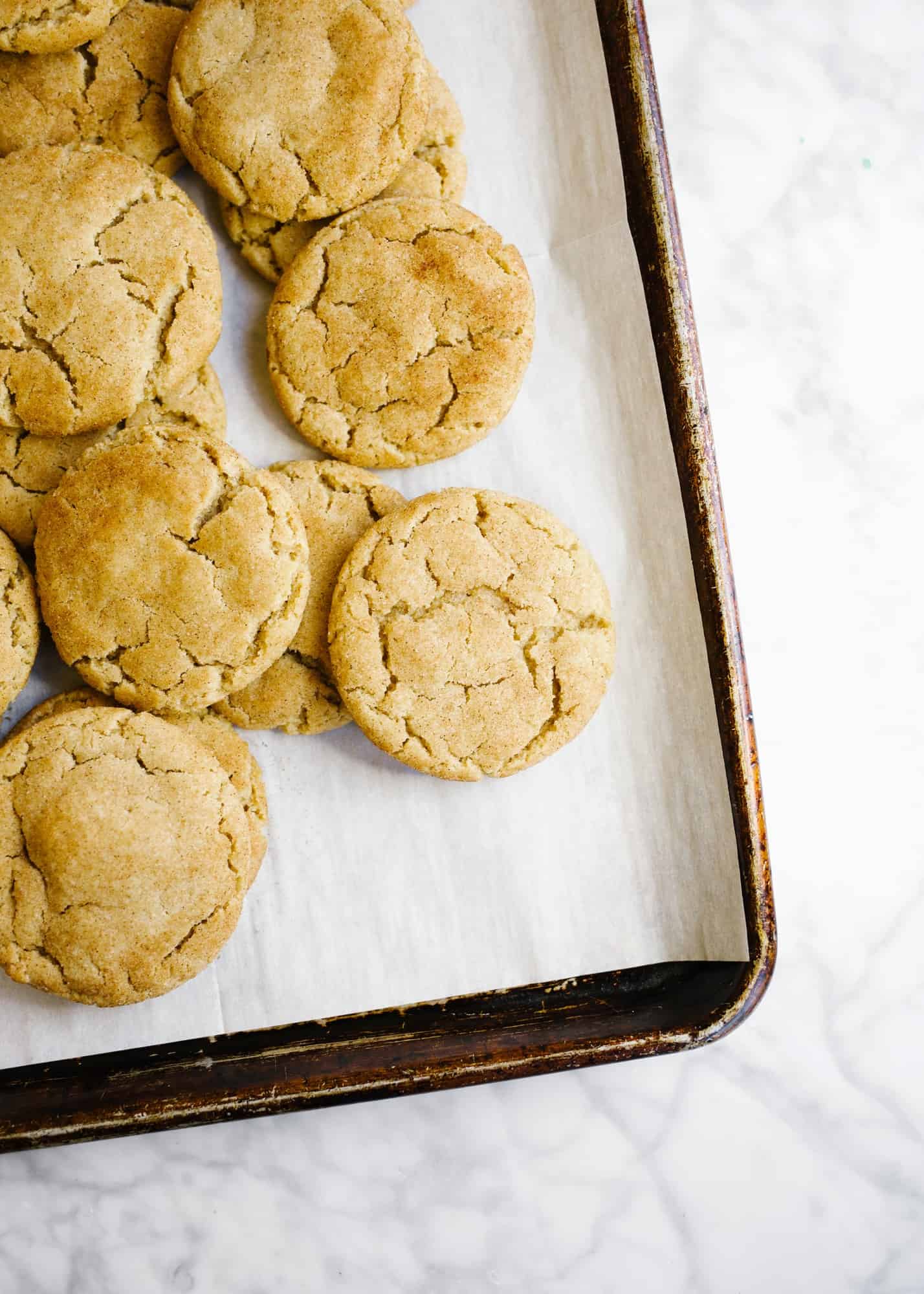 Bourbon Brown Butter Snickerdoodles by Wood and Spoon blog. These are chewy brown sugar snickerdoodles scented with bourbon. Lightly salted and perfectly sweetened, these cookies are a delicious fall treat to serve a crowd or anyone who loves a little bourbon whiskey. Learn how simple it is to make these one-bowl cookies on thewoodandspoon.com