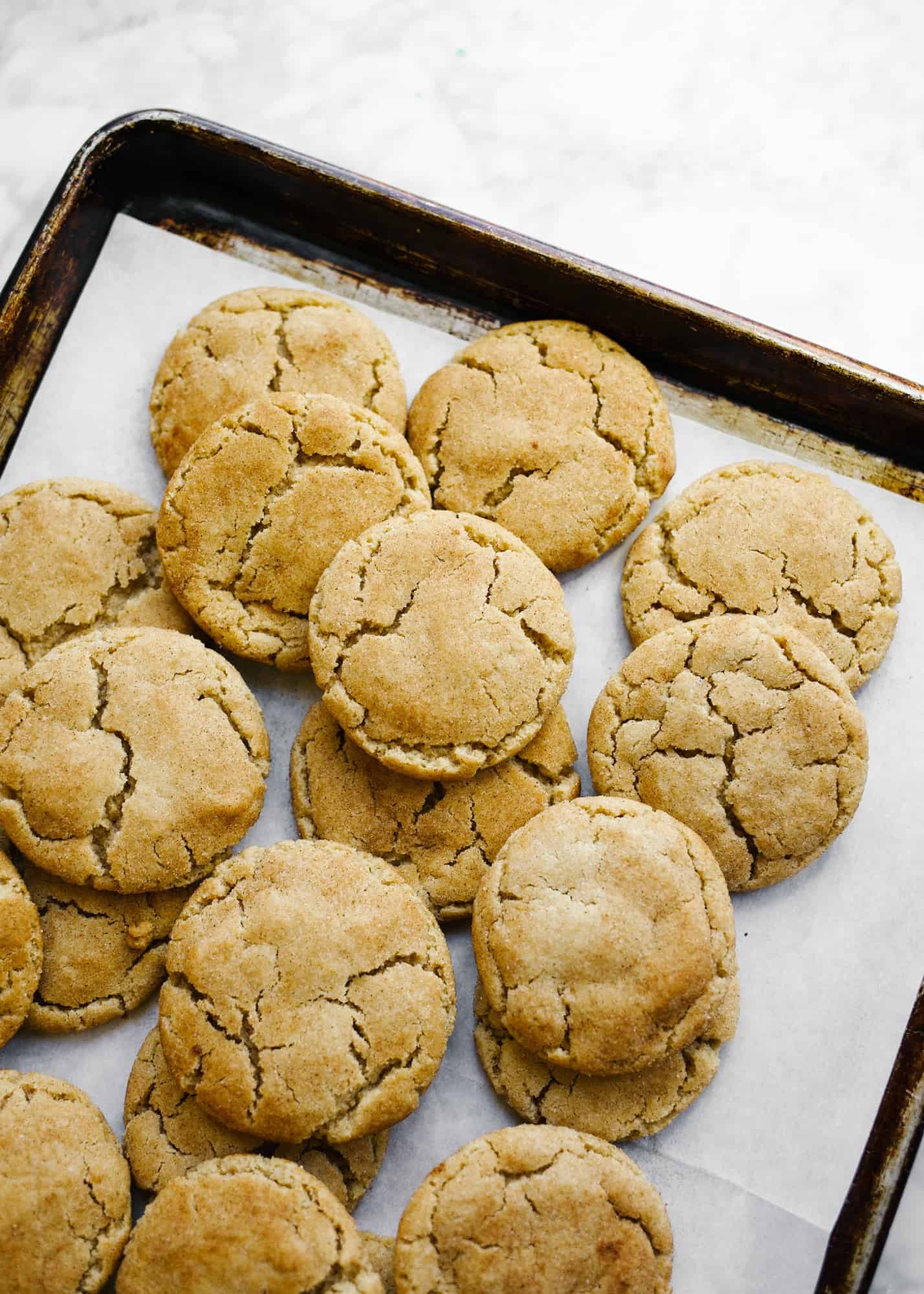 Bourbon Brown Butter Snickerdoodles by Wood and Spoon blog. These are chewy brown sugar snickerdoodles scented with bourbon. Lightly salted and perfectly sweetened, these cookies are a delicious fall treat to serve a crowd or anyone who loves a little bourbon whiskey. Learn how simple it is to make these one-bowl cookies on thewoodandspoon.com