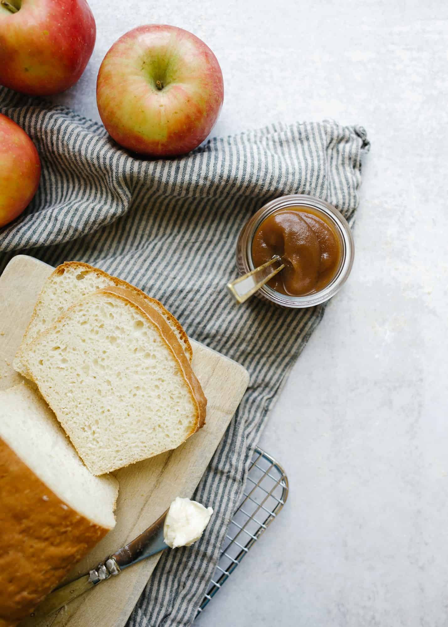 English Muffin Bread and Apple Butter this simple no knead one bowl quick rise yeast bread is a loaf form of the classic breakfast dish. Serve it with homemade maple apple butter made in a slow cooker/ crock pot. This is a simple make ahead baked good perfect for the fall. Read more at thewoodandspoon.com