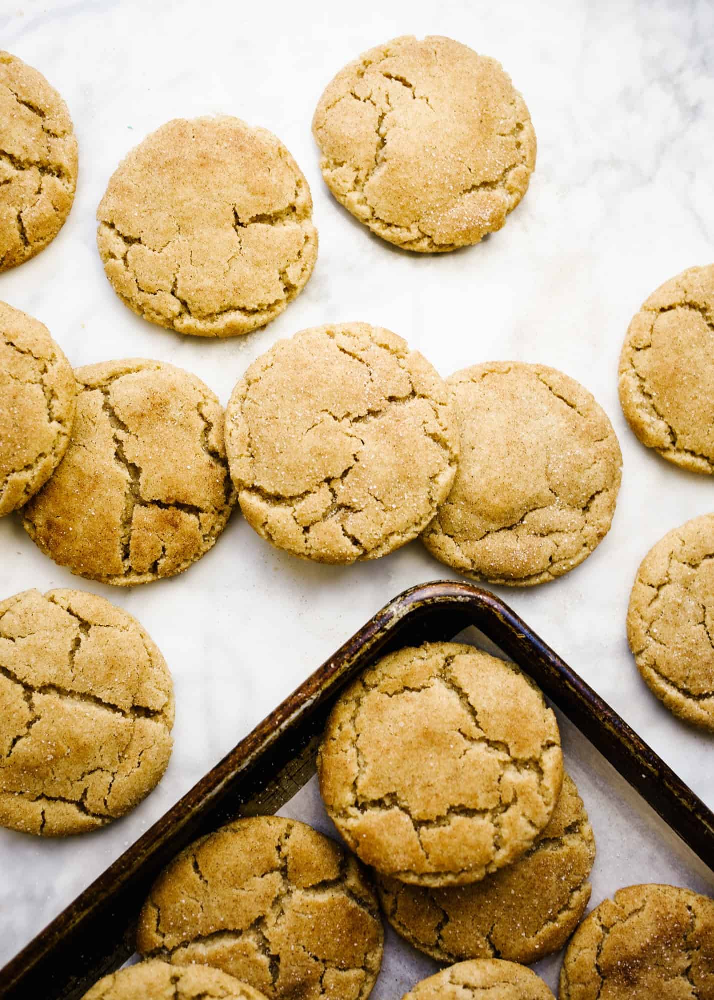 Bourbon Brown Butter Snickerdoodles by Wood and Spoon blog. These are chewy brown sugar snickerdoodles scented with bourbon. Lightly salted and perfectly sweetened, these cookies are a delicious fall treat to serve a crowd or anyone who loves a little bourbon whiskey. Learn how simple it is to make these one-bowl cookies on thewoodandspoon.com