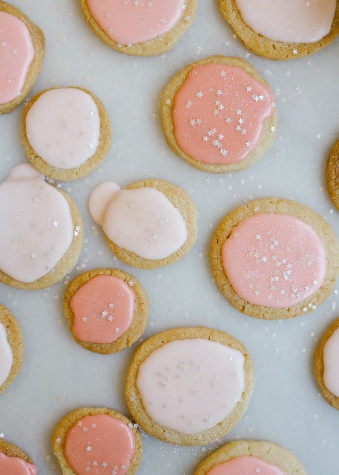 Citrus Shortbread Cookies by Wood and Spoon Blog. These are buttery cookies with zesty lemon, lime, or orange, and topped with a champagne glaze. You can use fruit juice to make the glaze instead if you prefer. These make excellent new year's eve party cookies or simple snacks to share with friends. Find the recipe on thewoodandspoon.com by Kate Wood