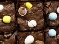 Mini Egg Brownies by Wood and Spoon blog. These are chewy homemade brownies filled with Cadbury mini eggs. These brownies are a great alternative to box mix brownies and the pastel candies make the brownies festive for the spring and Easter holidays. Find the recipe on thewoodandspoon.com