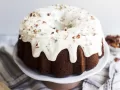 Hummingbird Bundt Cake by Wood and Spoon blog. Learn how to make this yummy textured Southern bundt cake filled with banana, coconut, pecans, and crushed pineapple! This recipe is a Southern classic and is great for th spring and easter holidays. Learn how to make it on thewoodandspoon.com